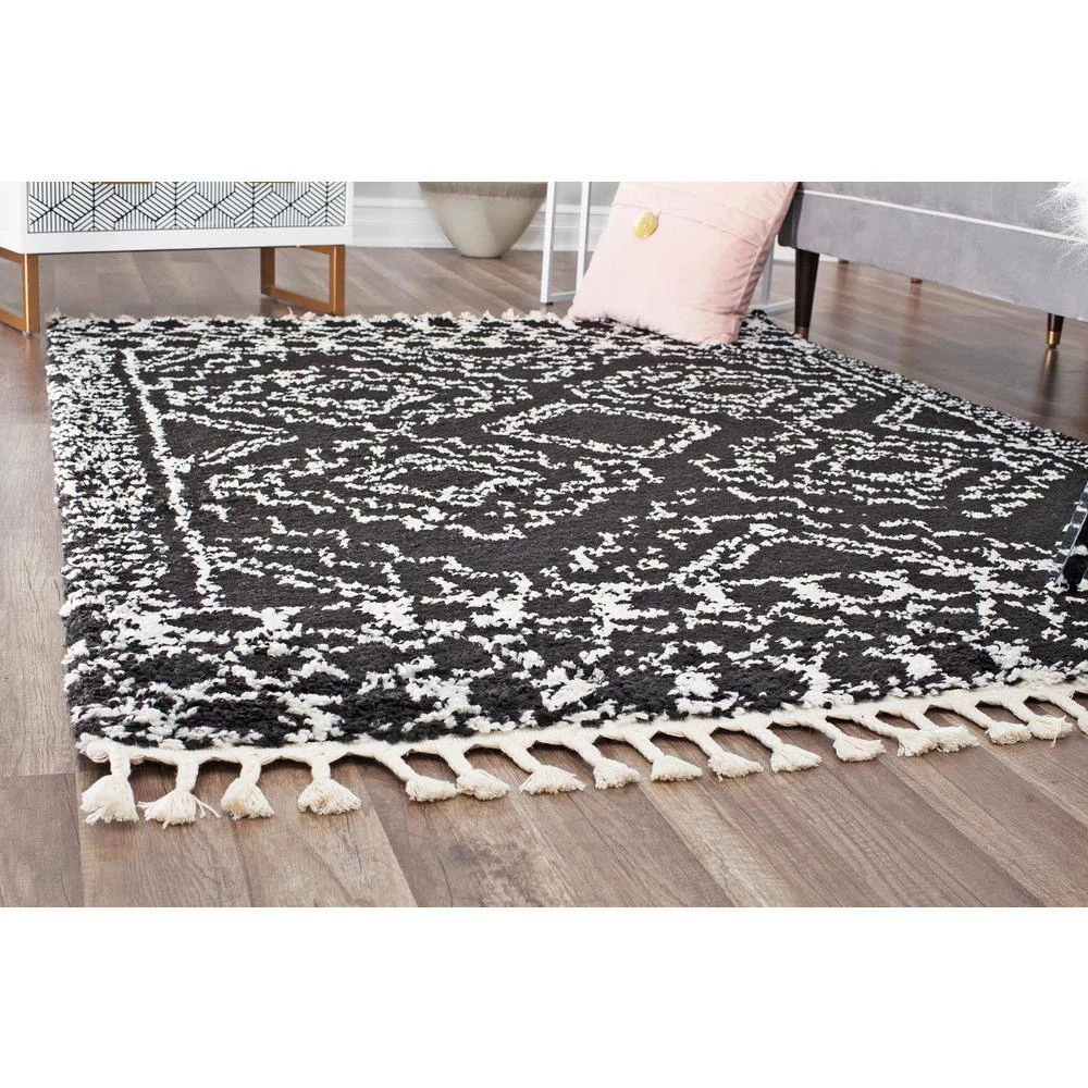 Mason Shag Sable Black 5 ft. x 7 ft. Area Rug by CosmoLiving by Cosmopolitan 7 Mason Shag Sable Black 5 ft. x 7 ft. Area Rug by CosmoLiving by Cosmopolitan - Image 5