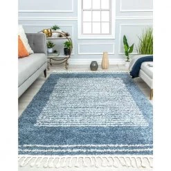 Hidden Oasis Blue 5 ft. x 7 ft. Stripe Shag Area Rug by CosmoLiving by Cosmopolitan -HOMELEGEND Sales blue cosmoliving by cosmopolitan area rugs ra32609 31 1000