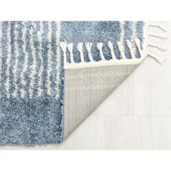 Hidden Oasis Blue 5 ft. x 7 ft. Stripe Shag Area Rug by CosmoLiving by Cosmopolitan -HOMELEGEND Sales blue cosmoliving by cosmopolitan area rugs ra32609 66 1000