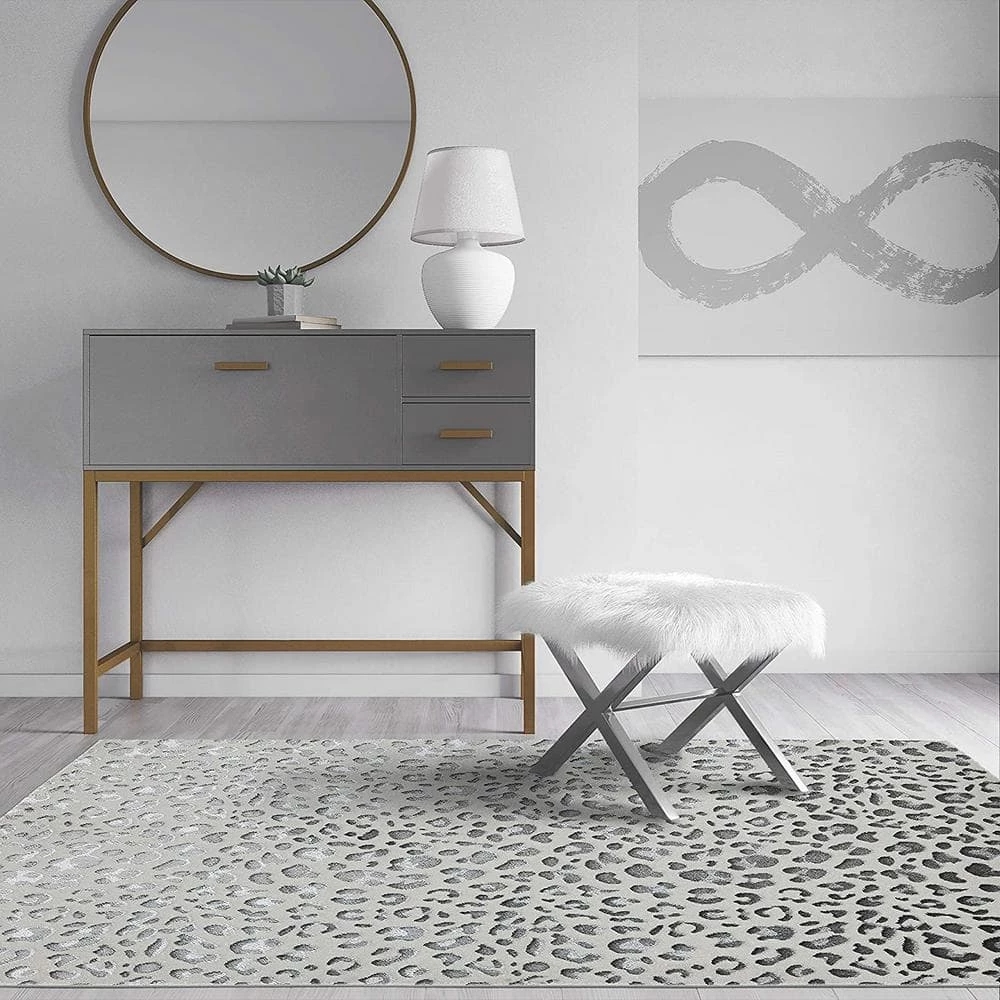 Hazel Snow Leopard White 5 ft. x 7 ft. Area Rug by CosmoLiving by Cosmopolitan 4 Hazel Snow Leopard White 5 ft. x 7 ft. Area Rug by CosmoLiving by Cosmopolitan - Image 2